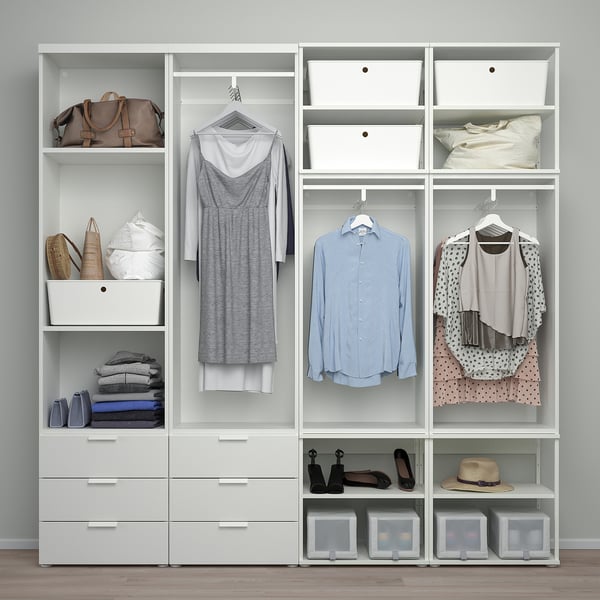 Modern closet with sliding doors, hanging clothes, drawers, and shelves. Efficient space organisation with adjustable feet.