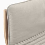 Neil sense a modern chairs backrest and armrest, with smooth fabric and sturdy wood.