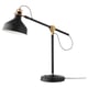 Option: A vintage-style black and gold RANARP desk lamp with an adjustable arm and shade.