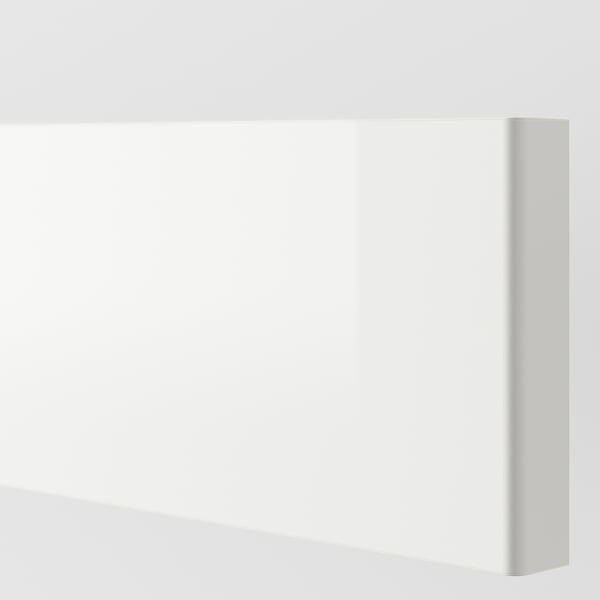 Sleek, white high-gloss kitchen cabinet front, showcasing modern, smooth, and durable design.