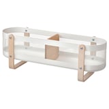 A white RISATORP organizer with birch veneer legs, holding items in compartments.