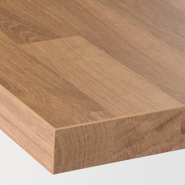 Close-up of a smooth, wooden countertop, showcasing its fine grain and polished finish.