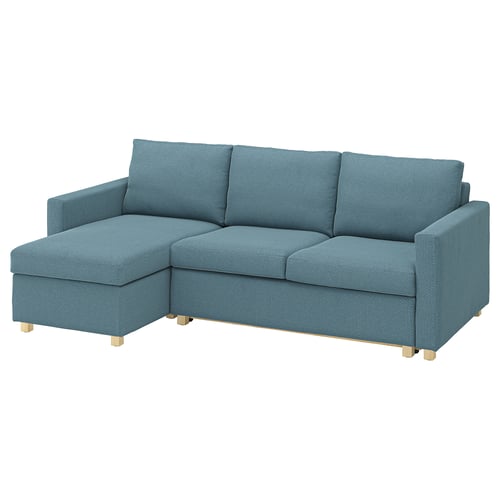 Blue sectional sofa-bed with left chaise, light wood legs, simple modern design.