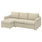 Modern l-shaped sofa in beige with clean lines and cushioned seats on wooden legs.