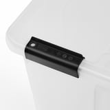 Black latch on clear container edge for secure closure.