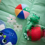 Colorful soft play mat with owl, frog, and apple toys. Suitable for babies to lie on and explore.