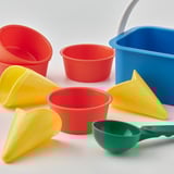 Bright colorful plastic beach toys; includes buckets, cones, cups, and scoop.