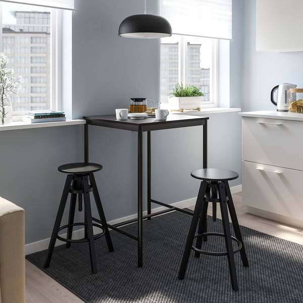 Small black sandberg bar set by window, modern, compact, sturdy metal & melamine.