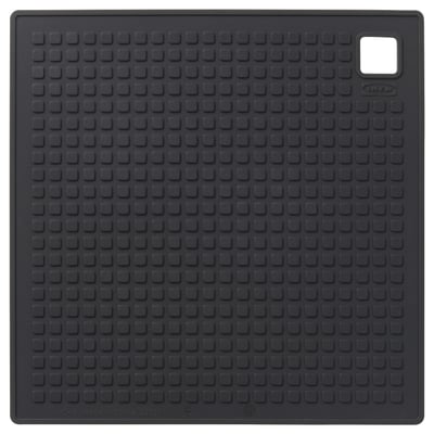 Ikea SANDVIVA black silicone trivet, square with small bumps, dishwasher safe.