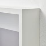 Close-up of white picture frame showing quality craftsmanship and clean corners.