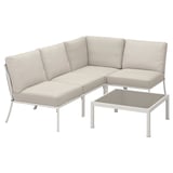 A modern outdoor corner sofa set, white metal frame with beige cushions and a matching coffee table.