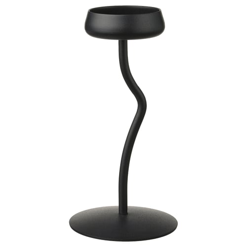 Black modern candlestick, inspired by flower stems, with sleek curved design and sturdy base. Part of the SILVERPÄRON series.