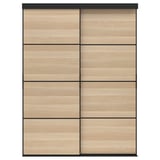 A SKYTTA wooden closet. It six light brown sliding doors framed in black. The modern design includes vertical grooves for a sleek look.