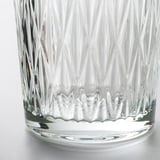 Clear glass vase with intricate, ridged design, showcasing high-quality craftsmanship and elegant, timeless style.