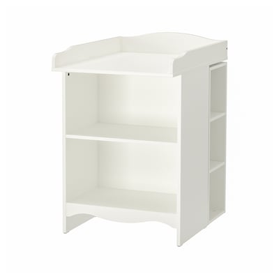 Displays a white SMÅGÖRA changing table with storage. The design is simple and functional, featuring an open shelf and space for additional shelves.