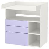 Depicts a white and purple SMÅSTAD changing table with open compartments. Multiple shelves and drawers.