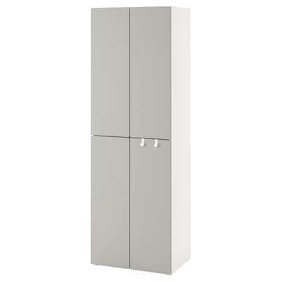 A SMÅSTAD wardrobe in white. It is a tall, rectangular cabinet with two doors featuring soft-close hinges, suitable for a small space.