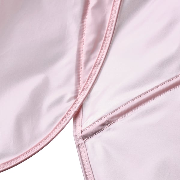 Close-up view of a smooth, pink fabric with neat stitching, likely from a high-quality, eco-friendly textile product.