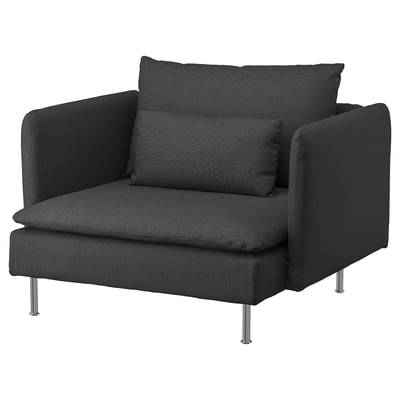 Dark gray SÖDERHAMN armchair with wave-patterned cushions, deep seats, and high legs.