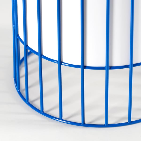 Blue metal cage structure, part of SOLVINDEN solar lamp, sleek and well-constructed.