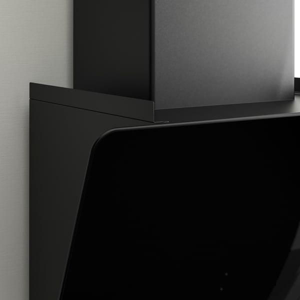 Modern black range hood with clean lines, glass surface, and sleek design.