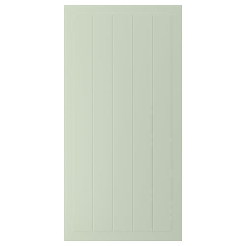 A green STENSUND cabinet door with vertical grooves, made from fiberboard and painted with polyurethane and acrylic finishes.