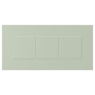 Green cabinet door with grooved panels, fiberboard, polyurethane, and acrylic paint.