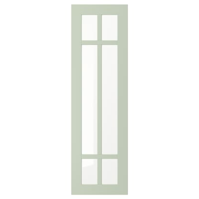 A STENSUND light green cabinet door with a crosshatched glass panel design.