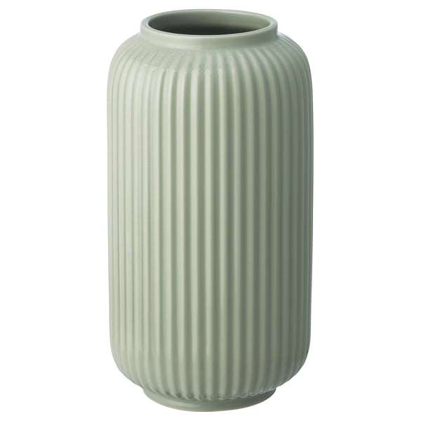 A cylindrical, light green vase named STILREN made of colored glaze and stoneware. It has vertical ridges and a simple, elegant design.