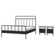 Black metal bed frame with curved lines and two matching nightstands.