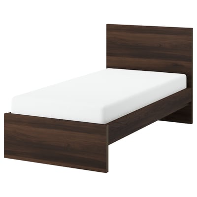 Dark brown wooden bed with white mattress. Simple, modern design, sturdy.