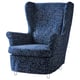 A blue floral-patterned STRANDMON wing chair with black metal legs. The design is elegant and comfortable.