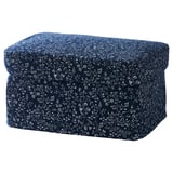 A dark-blue floral-patterned STRANDMON footstool with a comfortable, rectangular shape.