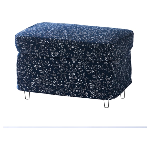 Navy blue floral-patterned footstool with metal legs.