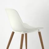 A sleek, modern chair with a white plastic seat and sturdy wooden legs.