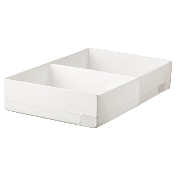 A white STUK storage box with a divided compartment, designed for organizing and storing clothes, made from polyester, including recycled material.
