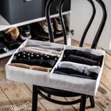 Box organizer with socks. White, divided, fits drawer, recycled polyester.