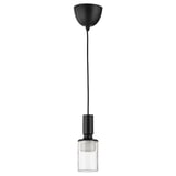 A SUNNEBY pendant lamp with a black textile cord and a rectangular, hammered glass bulb.