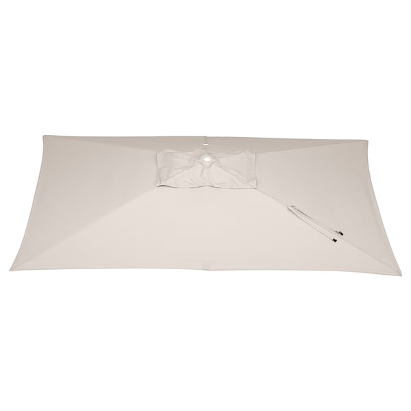 A beige, closed rectangular parasol canopy with a central vent and a strap with a buckle.