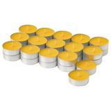 Collection of yellow scented tea candles in silver cups, neatly arranged.