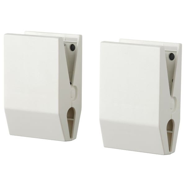 Two white magnetic clips for attaching photos or notes, matte finish, rectangular shape with slits.