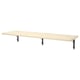 A beige wooden wall shelf called TRANHULT. It has three dark metal brackets supporting it, offering a modern and simple look.
