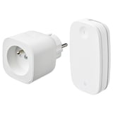 Displays two white smart home devices: a plug adapter and a remote control, both sleek and minimalist.