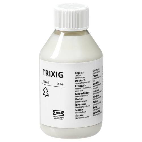 Leather conditioner in white bottle with multi-language labels.