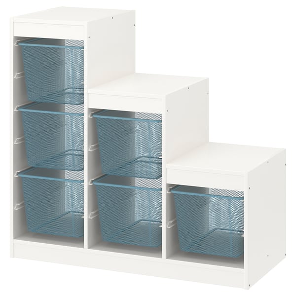 A white TROFAST storage unit with blue mesh bins arranged in steps.