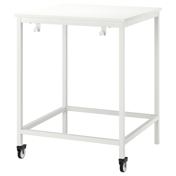 TROTTEN white metal table, rectangular, four wheels, minimalist design, perfect for small spaces.