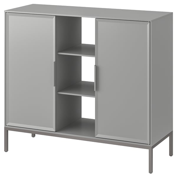 A modern, gray TULLSTORP metal sideboard with sleek, beveled doors and open shelves for storage.