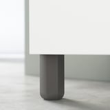 Modern table leg, dark grey, cylindrical shape. Part of ikeas ULLARP design.