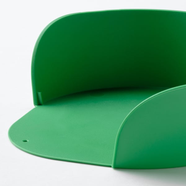Close-up of vibrant green UPPFYLLD prep bowl. Sleek design, smooth texture, slightly curved edges.