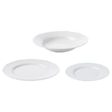 Three white porcelain dishes with ruffled edges arranged in triangle. Elegant and rustic design, durable, dishwasher-safe.
